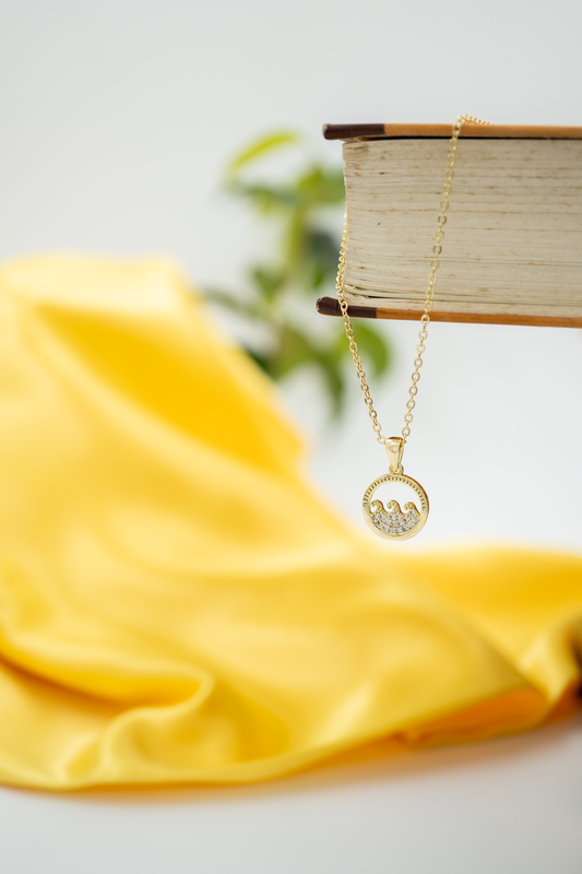 Radiant Circle Gold Pendant